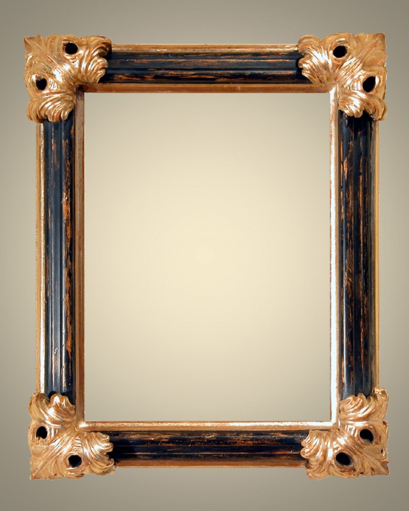 Cornici Laccate - oro a guazzo - 674/55  Nero oro - Cornice in legno di tiglio massello laccata a mano con bordo interno ed esterno&nbsp; in oro a guazzo lucidato con pietre dâ€™agata e ossidato. Negli angoli foglie scolpite e dorate a mano. Rifinita con patine e cere naturali. Oltre che nelle misure standard, questo modello Ã¨ disponibile anche in misure a richiesta. Disponibile in  altri colori e finiture. Caratteristiche tecniche:Larghezza: mm 60Altezza: mm 50Altezza Battuta: mm 25 - Cornici artigianali - Casa d'Arte - Bra (CN)