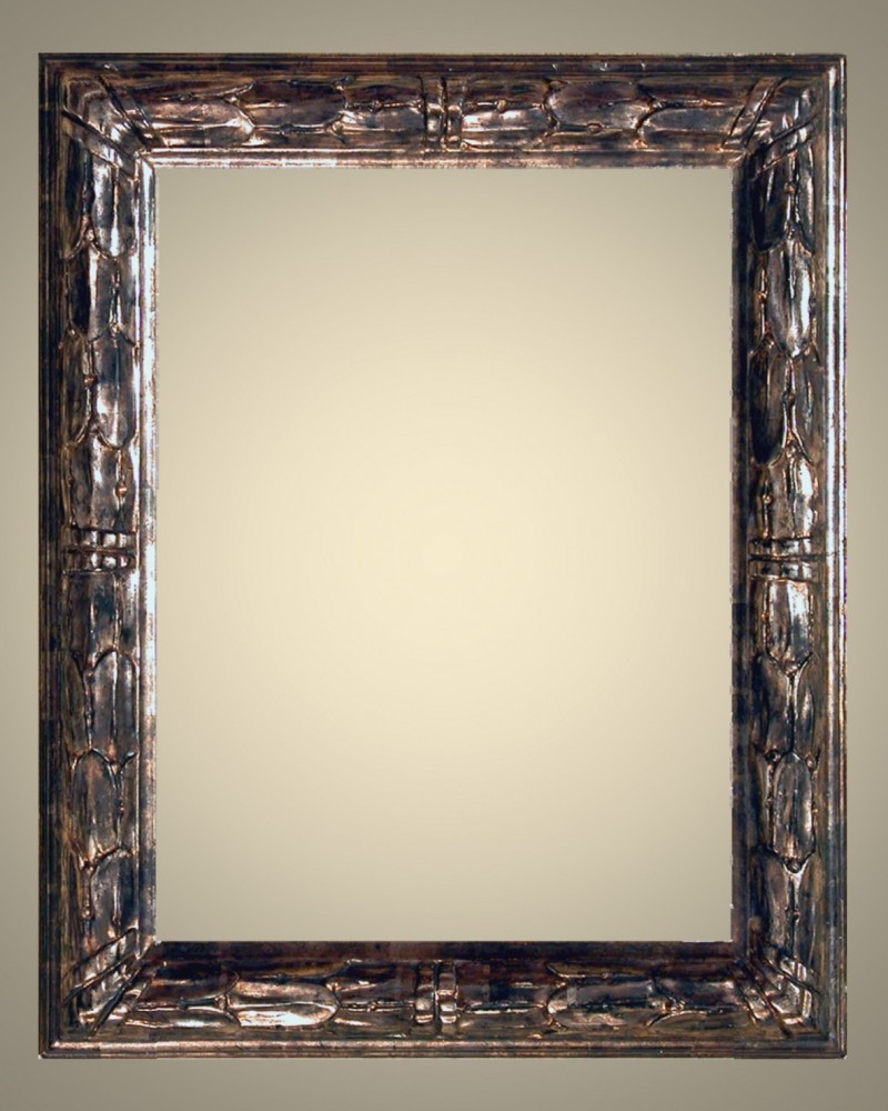 Cornici Laccate - oro a guazzo - 669/6 Argento - Cornice in legno di tiglio massello  intagliata a mano,&nbsp;argento fino a&nbsp;foglia a guazzo, lucidato e brunito con pietre dâ€™agata. Rifinita con patine e cere naturali.Oltre che nelle misure standard, questo modello Ã¨ disponibile anche in misure a richiesta e in&nbsp;oro.&nbsp; Caratteristiche tecniche:Larghezza: mm 60Altezza: mm 50Altezza Battuta: mm 28 - Cornici artigianali - Casa d'Arte - Bra (CN)