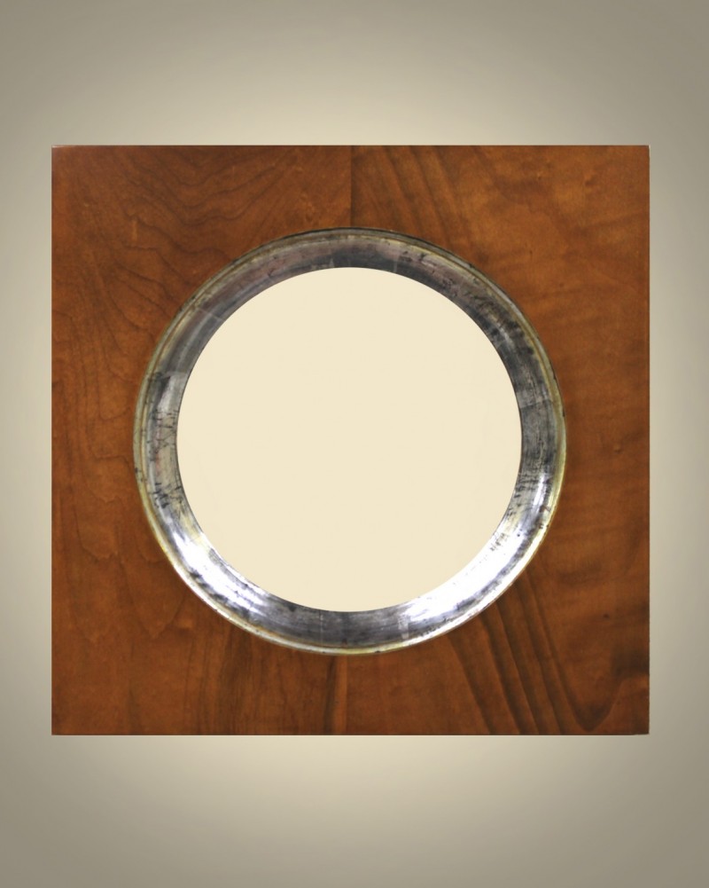 Cornici Speciali - 905 diam. 20 Ciliegio argento - Cornice con tondo in legno di ciliegio nazionale massello, filo interno in argento fino a guazzo, lucidato con pietre dâ€™agata,levigata a mano e lucidata con gomma lacca a tampone rifinita con cera patinata.&nbsp; A richiesta possibilitÃ  di altre misure e diametriCaratteristiche tecniche : misura esterna: mm 325 x mm 325diametro :&nbsp; mm 200 - Cornici artigianali - Casa d'Arte - Bra (CN)