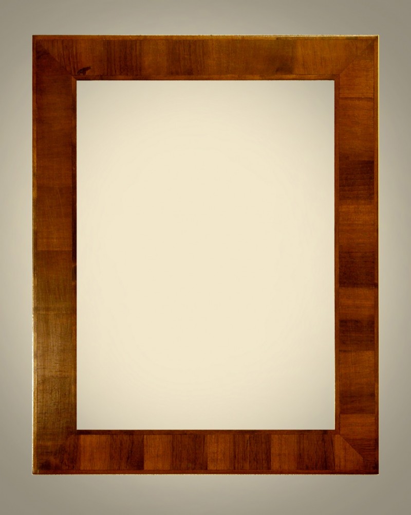 Cornici Lastronate - 410/5 - Cornice lastronata in legno di&nbsp;noce nazionale su base in legno di tiglio massello, levigata e verniciata a mano, lucidata con cere e patine naturali. Oltre che nelle misure standard, questo modello Ã¨ disponibile anche in misure a richiesta. Caratteristiche tecniche:Larghezza: mm 50Altezza: mm 20Altezza Battuta: mm 14 - Cornici artigianali - Casa d'Arte - Bra (CN)