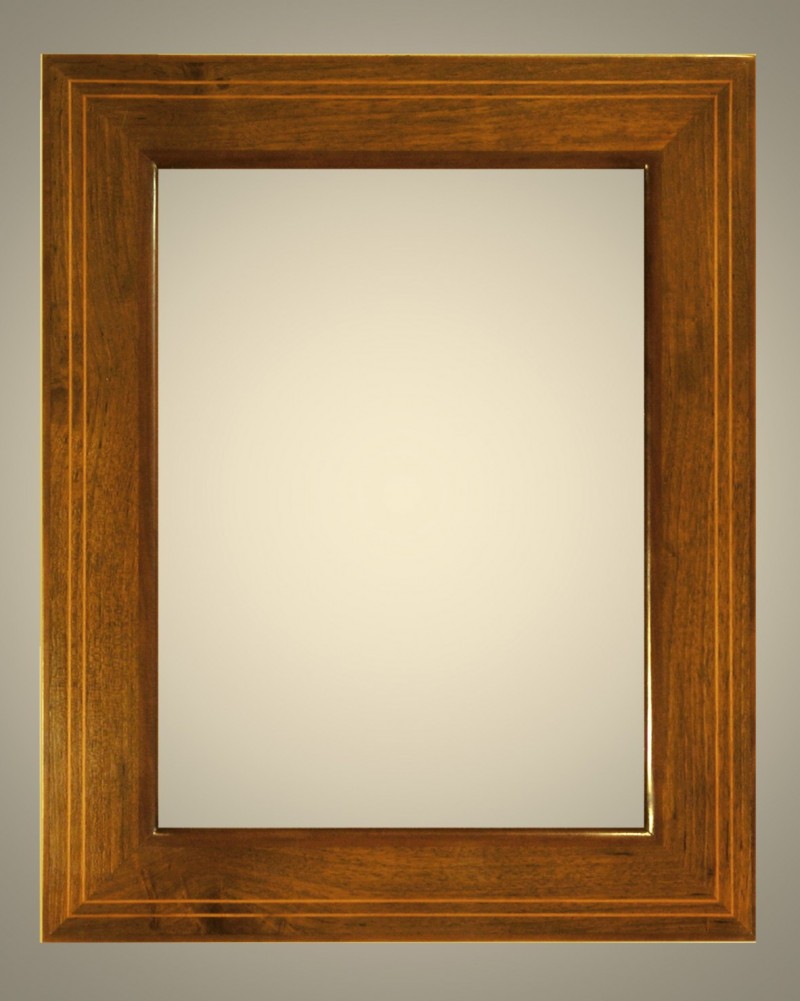 Cornici Lastronate - 310/N  - Cornice lastronata in legno di noce nazionale, intarsiata con doppio filetto in bosso zappatero, levigata e verniciata a mano, lucidata con cere e patine naturali.&nbsp;Oltre che nelle misure standard, questo modello Ã¨ disponibile anche in misure a richiesta. Caratteristiche tecniche:Larghezza: mm 70Altezza: mm 25Altezza Battuta: mm 11&nbsp; - Cornici artigianali - Casa d'Arte - Bra (CN)