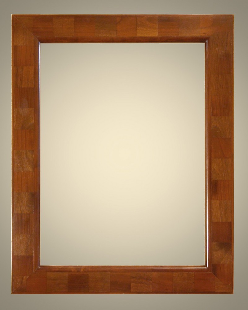 Cornici Lastronate - 298/35 - Cornice lastronata in legno di noce nazionale e ciliegio nazionale. levigata e verniciata a mano, lucidata con cere e patine naturali.Oltre che nelle misure standard, questo modello Ã¨ disponibile anche in misure a richiesta. Caratteristiche tecniche:Larghezza: mm 55Altezza: mm 25Altezza Battuta: mm 11 - Cornici artigianali - Casa d'Arte - Bra (CN)