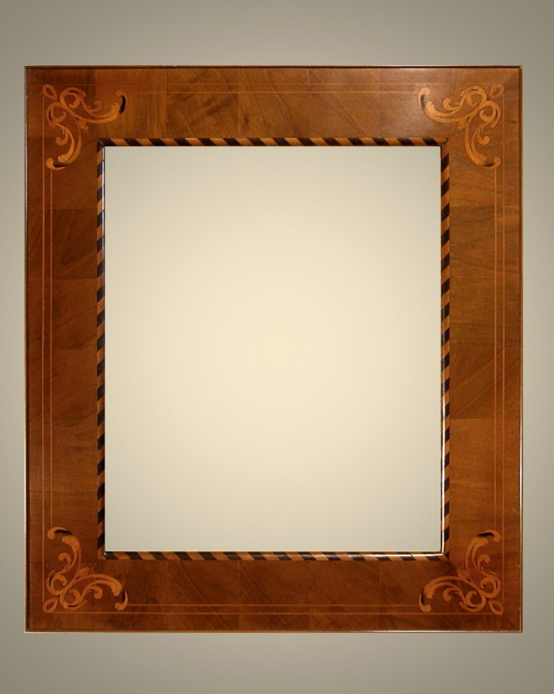 Cornici Lastronate - 200/10  - Cornice lastronata in legno di noce nazionale, intarsiata con doppio filetto in bosso zappatero, bordo interno a â€œtozzettiâ€ in noce del PerÃ¹ e melo, angoli intarsiati in acero, levigata e verniciata a mano, lucidata con cere e patine naturali.&nbsp; Oltre che nelle misure standard, questo modello Ã¨ disponibile anche in misure a richiesta. Caratteristiche tecniche:Larghezza: mm 120Altezza: mm 27Altezza Battuta: mm 11 - Cornici artigianali - Casa d'Arte - Bra (CN)